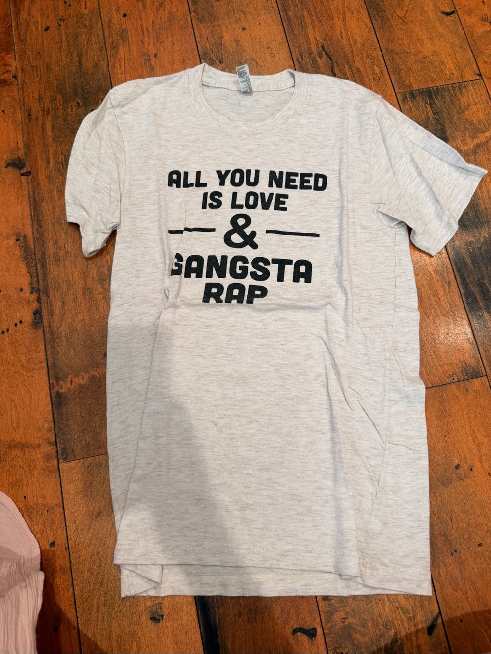 American Apparel Light Cream Short Sleeve Tee with Black Text Graphic